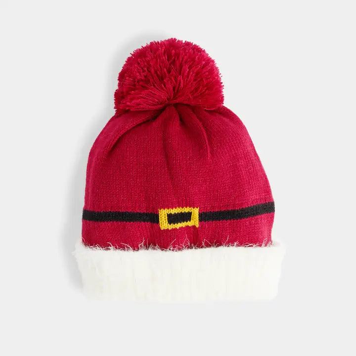 Red knitted Santa hat with a white beard on a light gray background