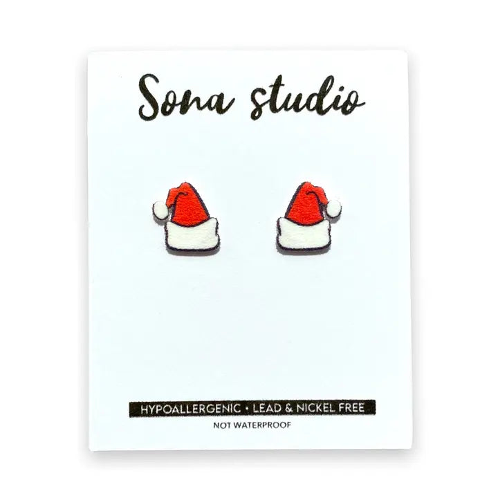 Santa hat earrings on a card with 'Sona Studio' branding