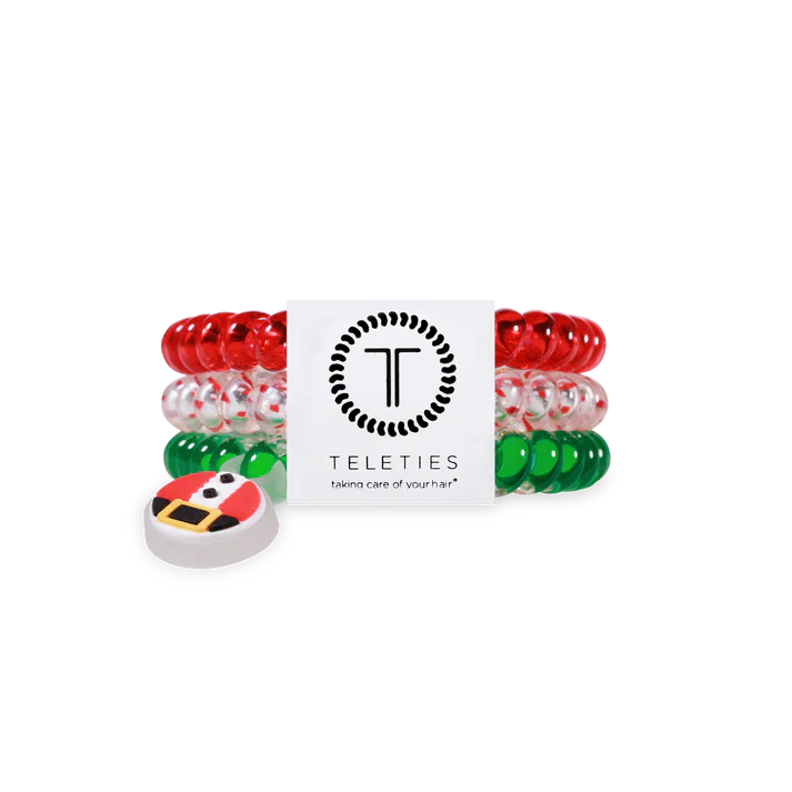 Set of colorful hair ties with a Teleties branded box on a white background