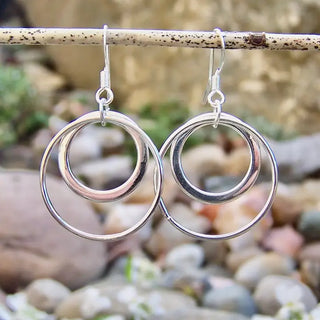 silver dangle earrings with two hoop charms