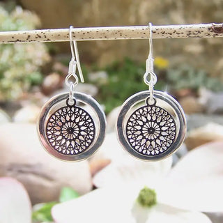 silver dangle earrings with hoops and mandala disc charm