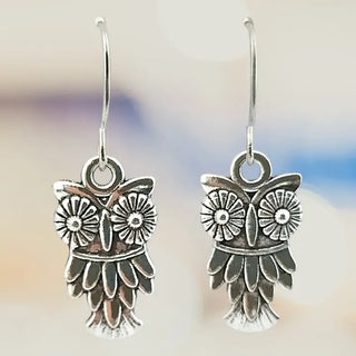 Silver owl dangle earrings
