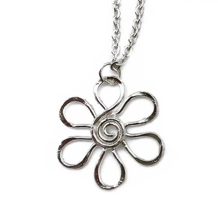 Silver flower-shaped pendant on a chain against a white background