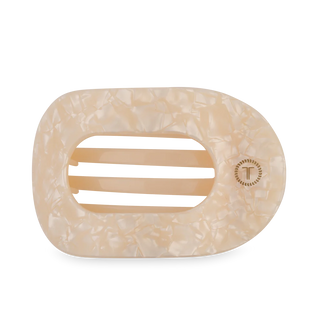 Beige marble-patterned hair clip on a white background
