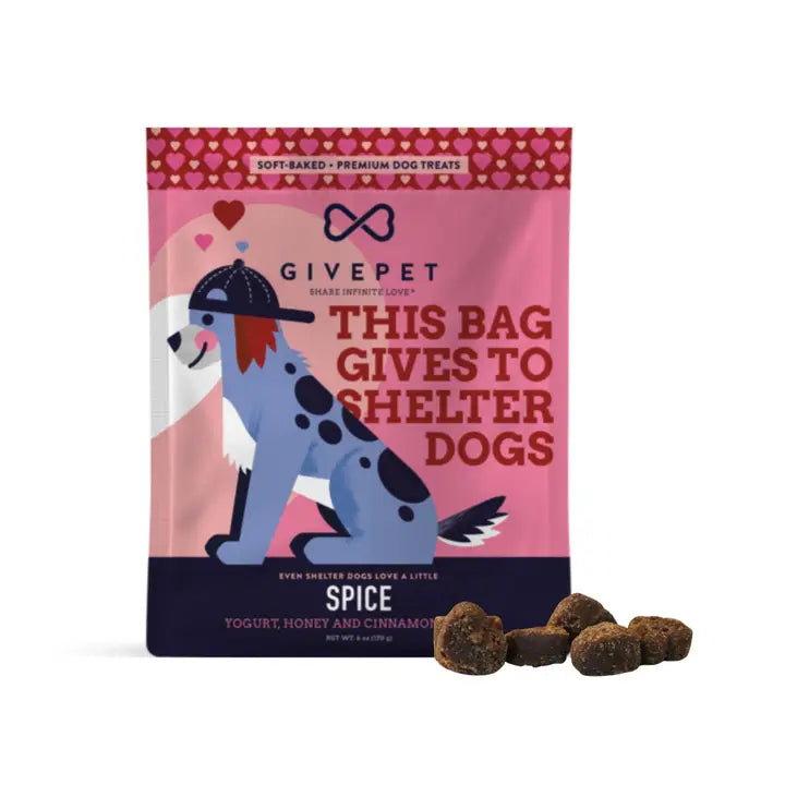 Dog treat package with cartoon dog and text 'This bag gives to shelter dogs' on a pink background