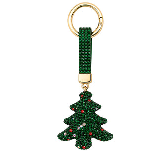 A Christmas tree-shaped keychain charm covered in sparkling green crystals with small red and white accents, attached to a green rhinestone strap and a gold-tone key ring on a plain white background.