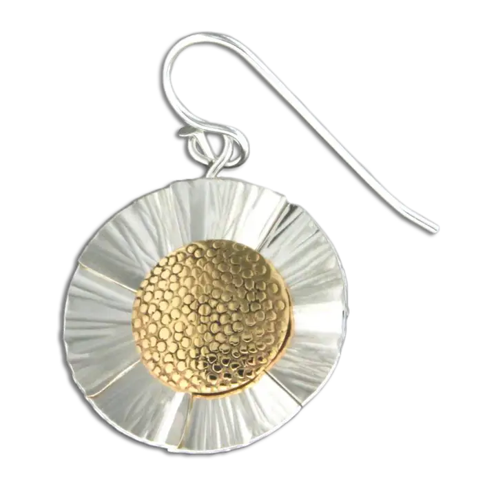 Silver and gold earring on a white background