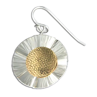 Silver and gold earring on a white background