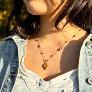 necklace with pink beads and sunflower pendant 