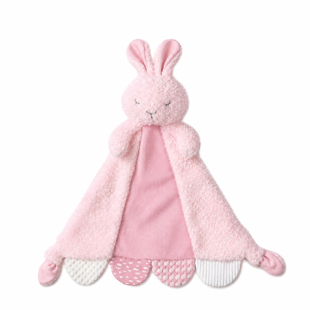 Pink bunny plush toy with a blanket on a white background