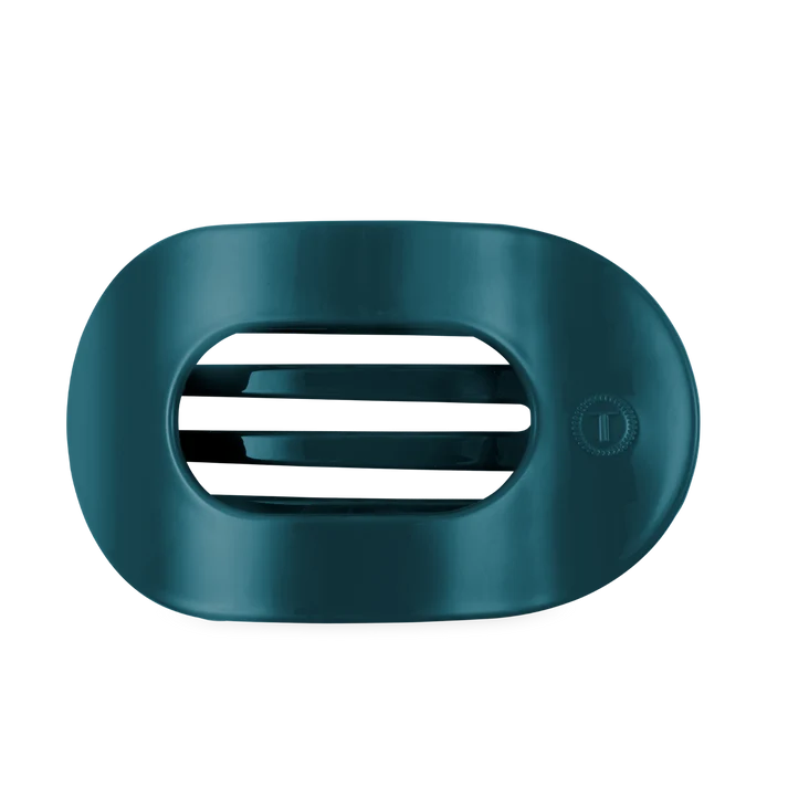 Teal colored oval shaped flat hair clip