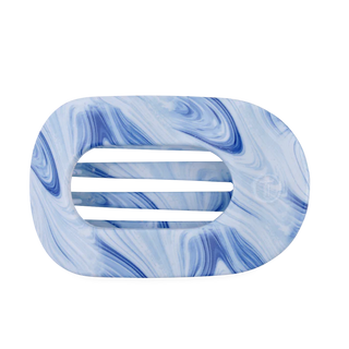 Marbled blue and white hair clip on a white background