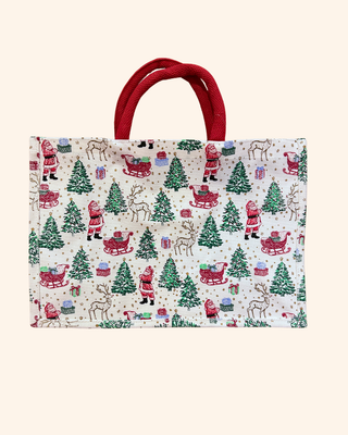 white bag with red and green christmas design