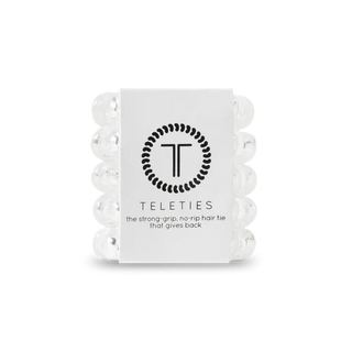 Pack of white hair ties with a brand logo on a white background