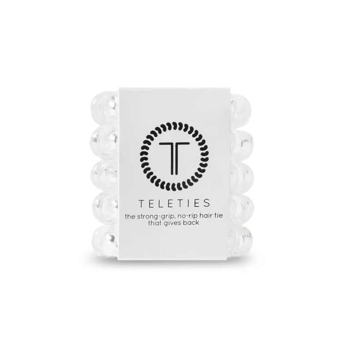 Pack of white hair ties with a brand logo on a white background