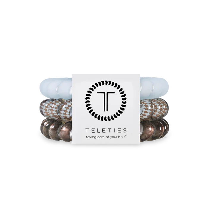 Set of hair ties with a Teleties branded card on a white background