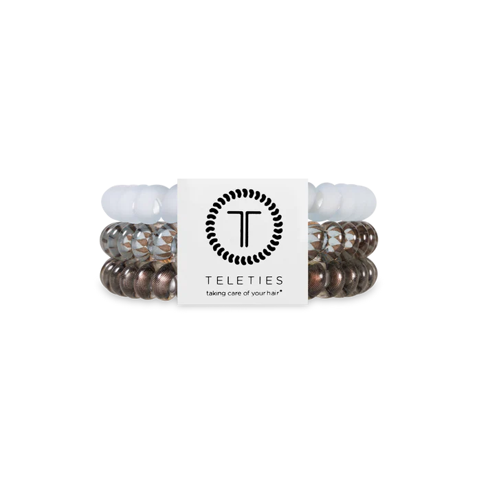 Set of hair ties with a Teleties branded card on a white background