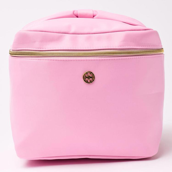 Pink cosmetic bag with gold zipper on a white background