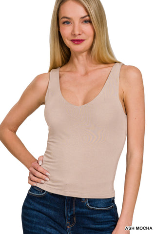 woman wearing tan v-neck tank top