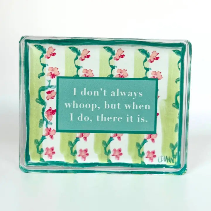 Floral-patterned soap with humorous text on a white background