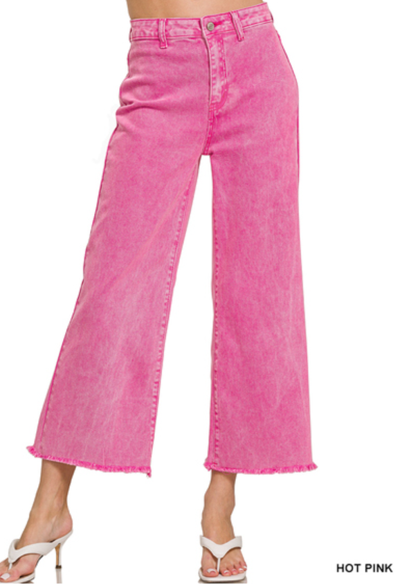 Hot pink jeans on a white background