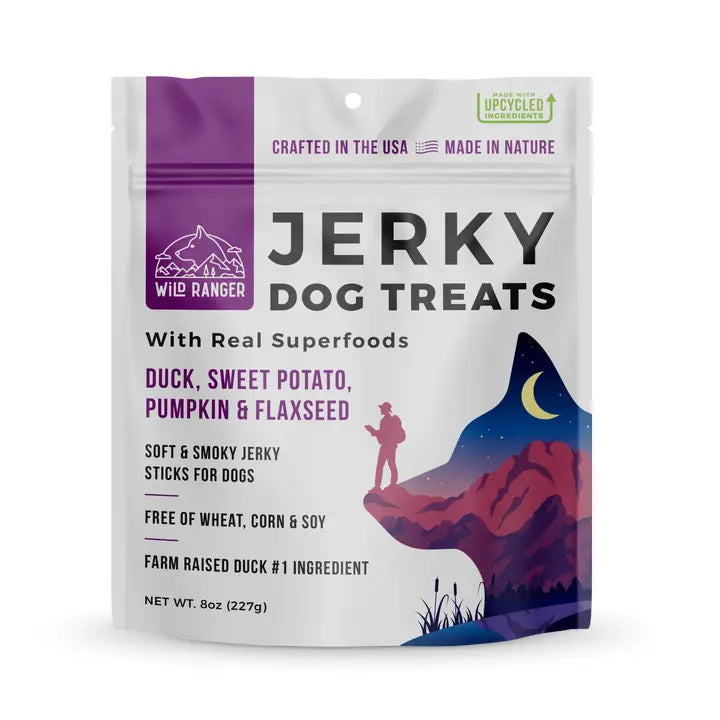 Jerky dog treats package with purple and white design on a white background