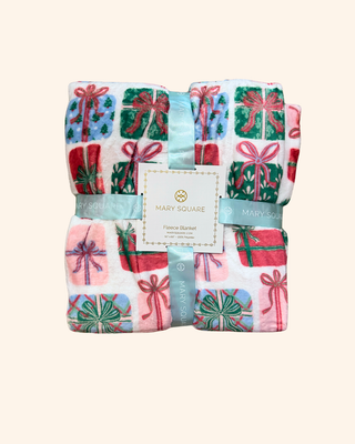Fleece Blanket, featuring a festive holiday design with multicolor gift boxes