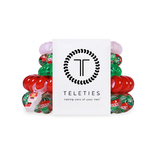 Set of colorful hair ties with a Teleties branded box on a white background