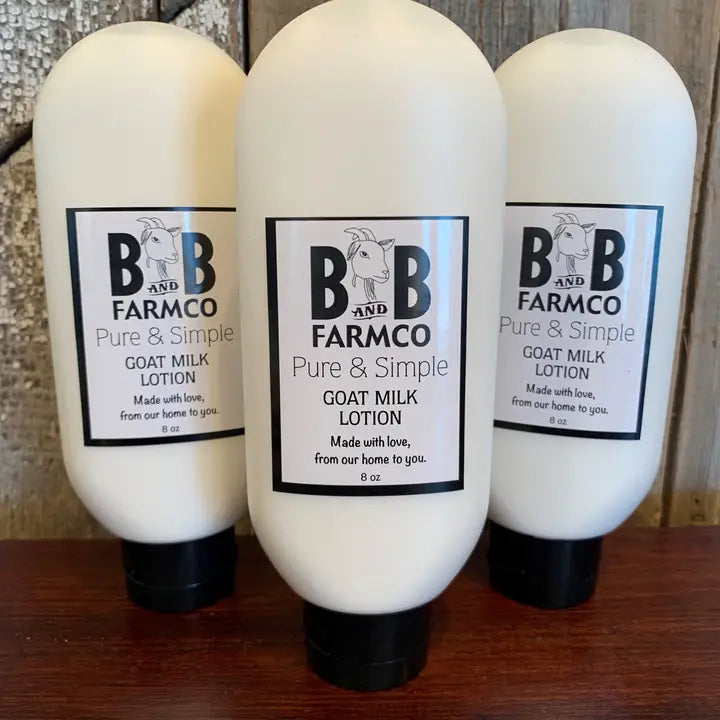 Three bottles of goat milk lotion