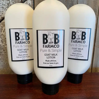 Three bottles of goat milk lotion