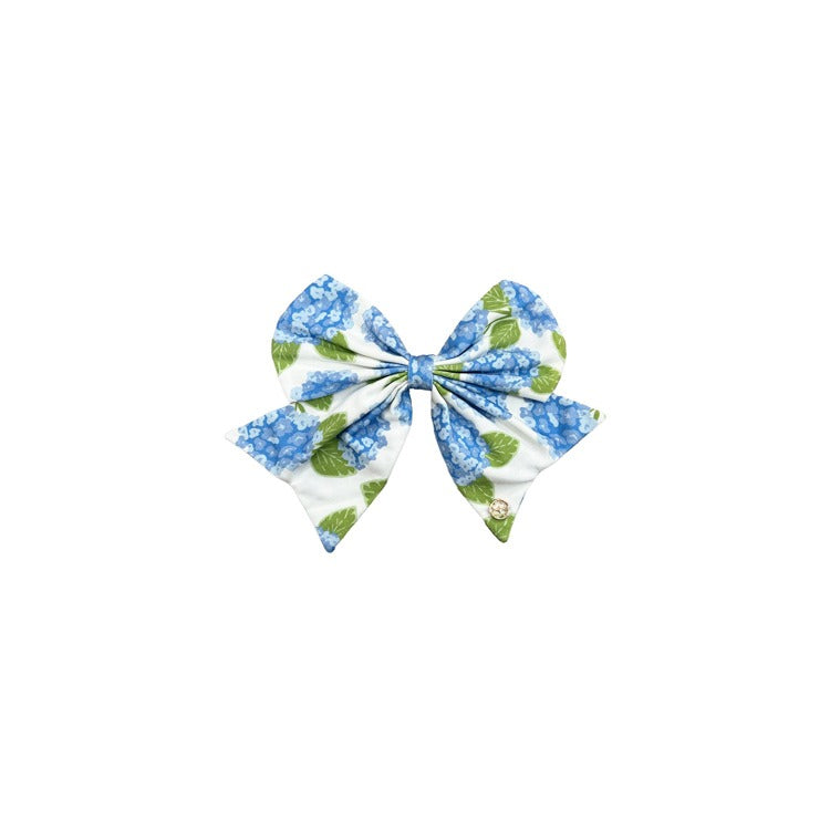 Floral patterned bow on a white background