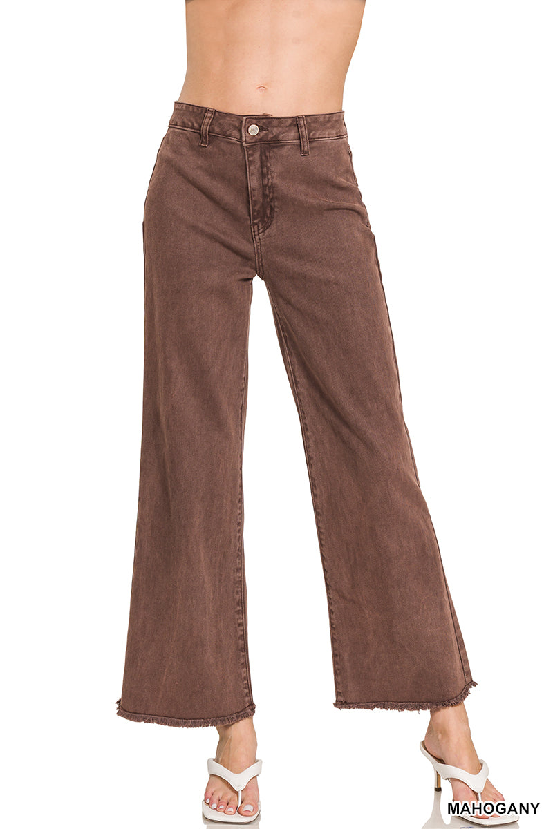Brown wide-leg jeans on a white background