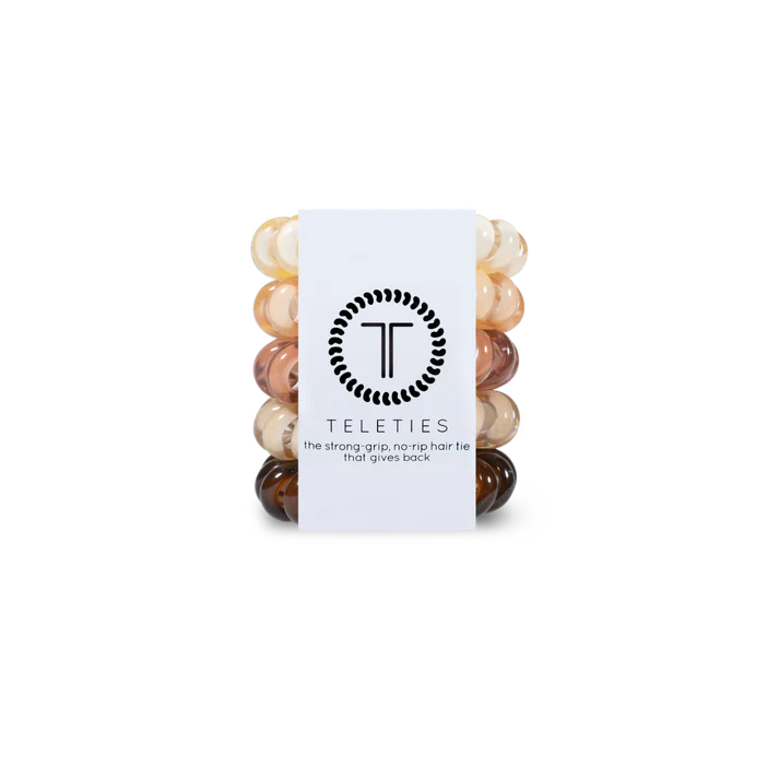 Set of hair ties with a Teleties branded card on a white background