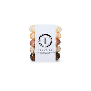Set of hair ties with a Teleties branded card on a white background