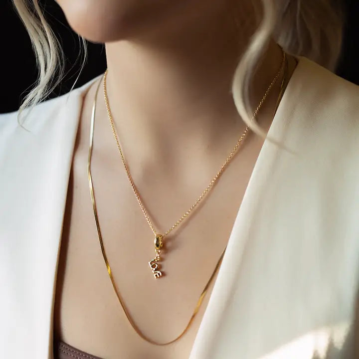 Gold "Love" Charm