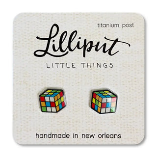 A pair of colorful cube-shaped earrings on a white background, labeled 'Lilliput Little Things' with text stating 'handmade in New Orleans'.