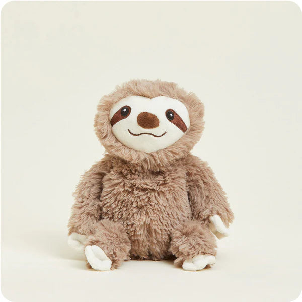 Plush toy sloth on a white background